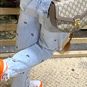 orange butterfly jeans
